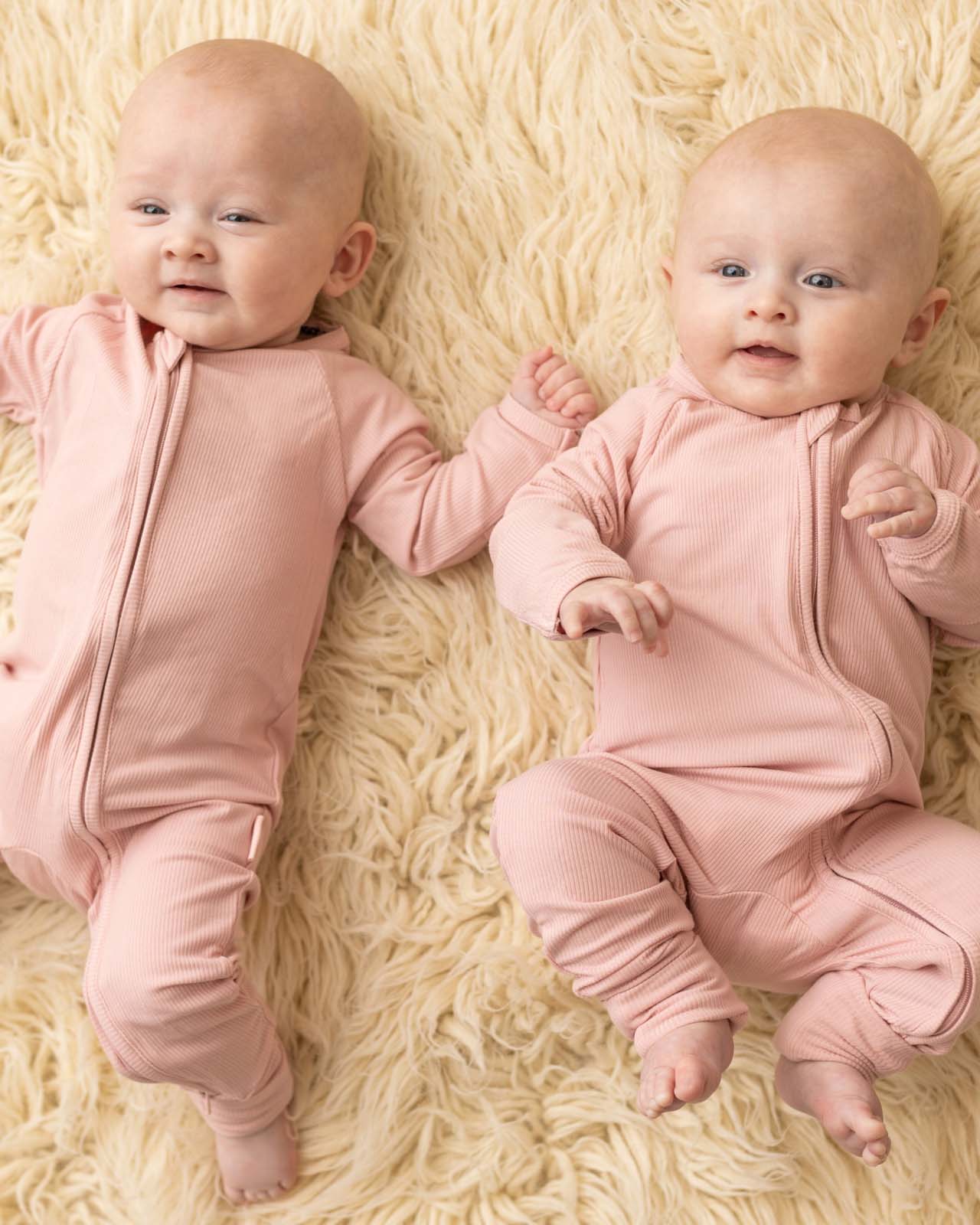 BABYGO® Dusty Pink Ribbed Zip Sleepsuit - Image 2